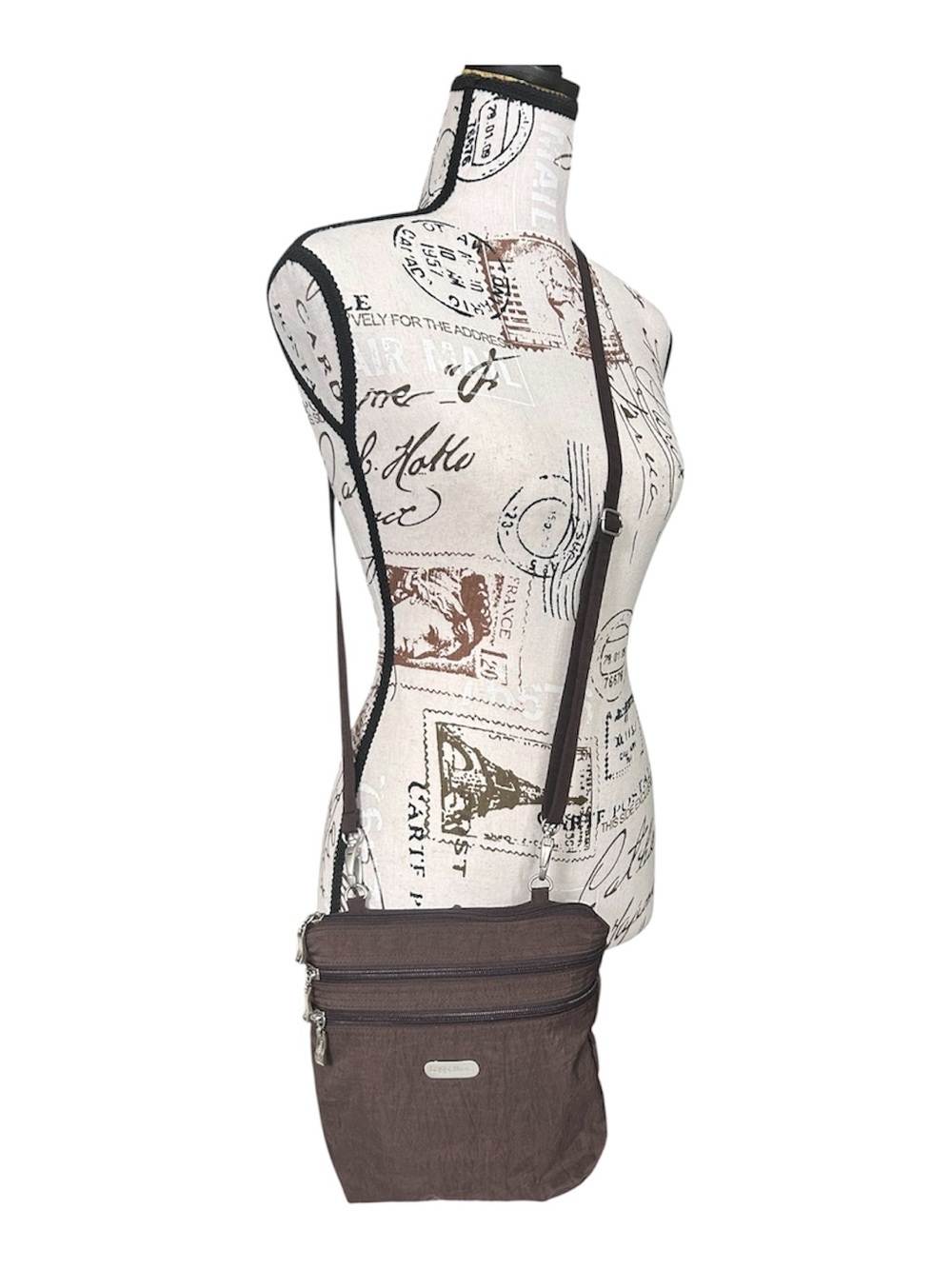 Baggallini chocolate brown crossbody purse with plenty of zippered storage